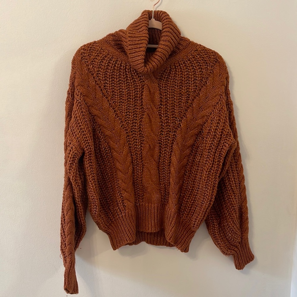 Oversized turtleneck burnt orange knit sweater